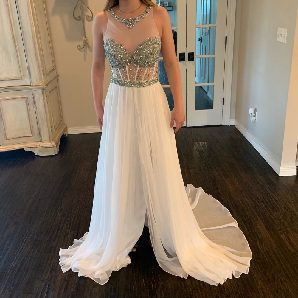 Beautiful white chiffon dress. fitted bodice with beading.  New, tags attached.